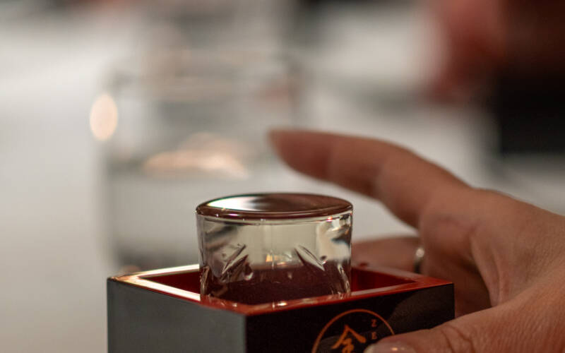 Masu Box used to serve the • Drip Pressed Shizuku Shibori Junmai Ginjo with the fourth course at the 2025 Sakura and Sake Dinner hosted at The George.