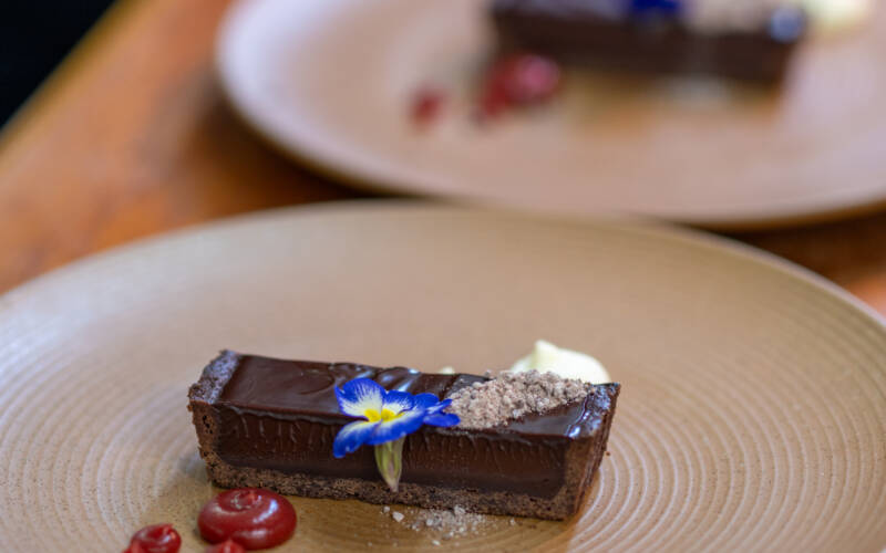 Dessert Course at the 2025 Sakura and Sake Dinner in Pescatore at The George - Dark chocolate tart with vanilla fromage and plum gel